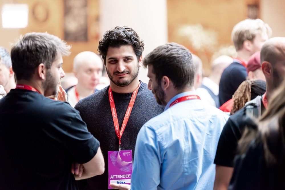 Attendees talking between sessions at AI Summit Europe